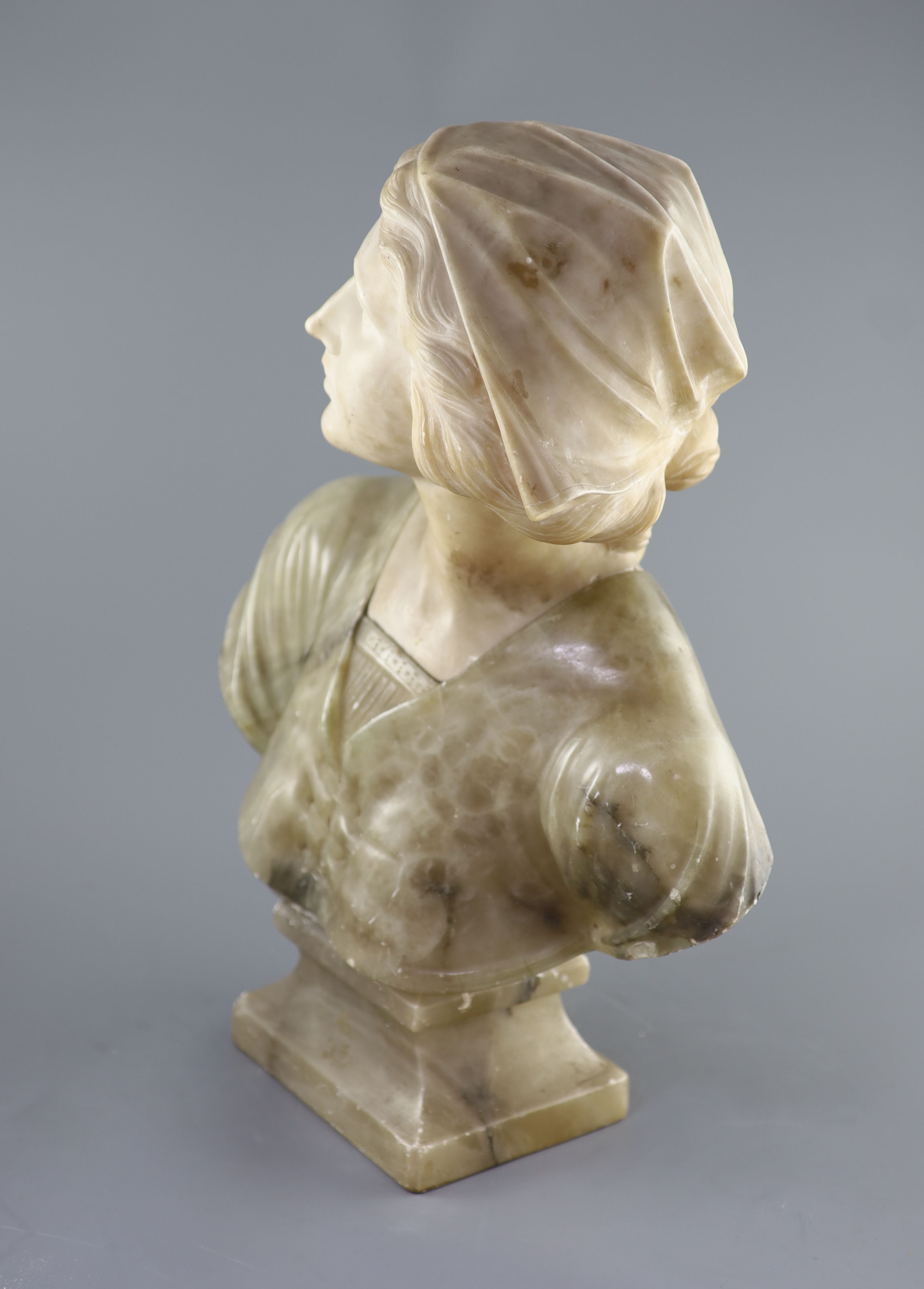 A carved Italian marble and alabaster study of a youth, 19th century (unsigned) 58cm high.